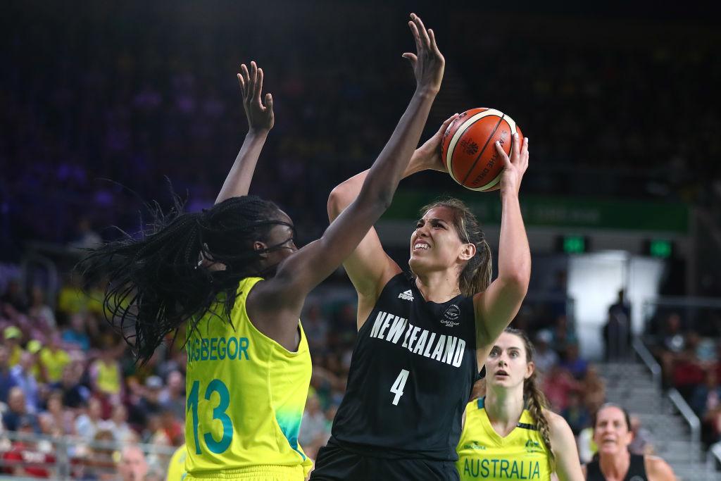Australians hand out basketball lesson