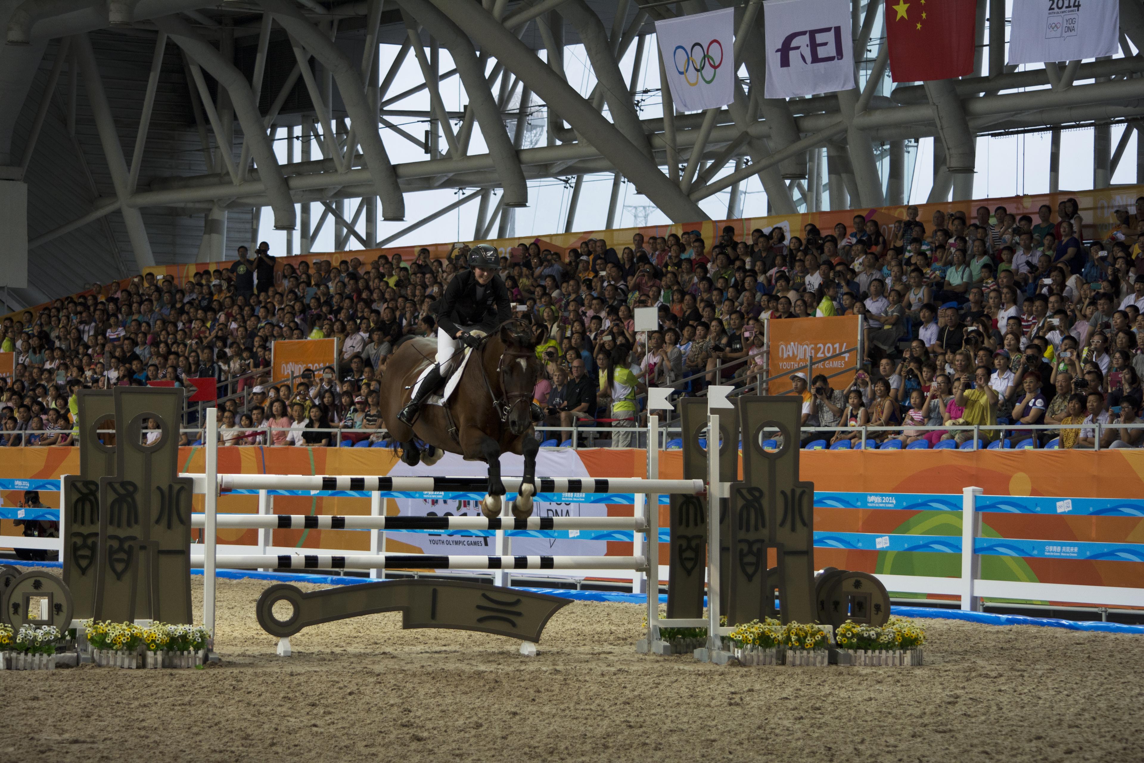 Gold in Show Jumping on Day Eight