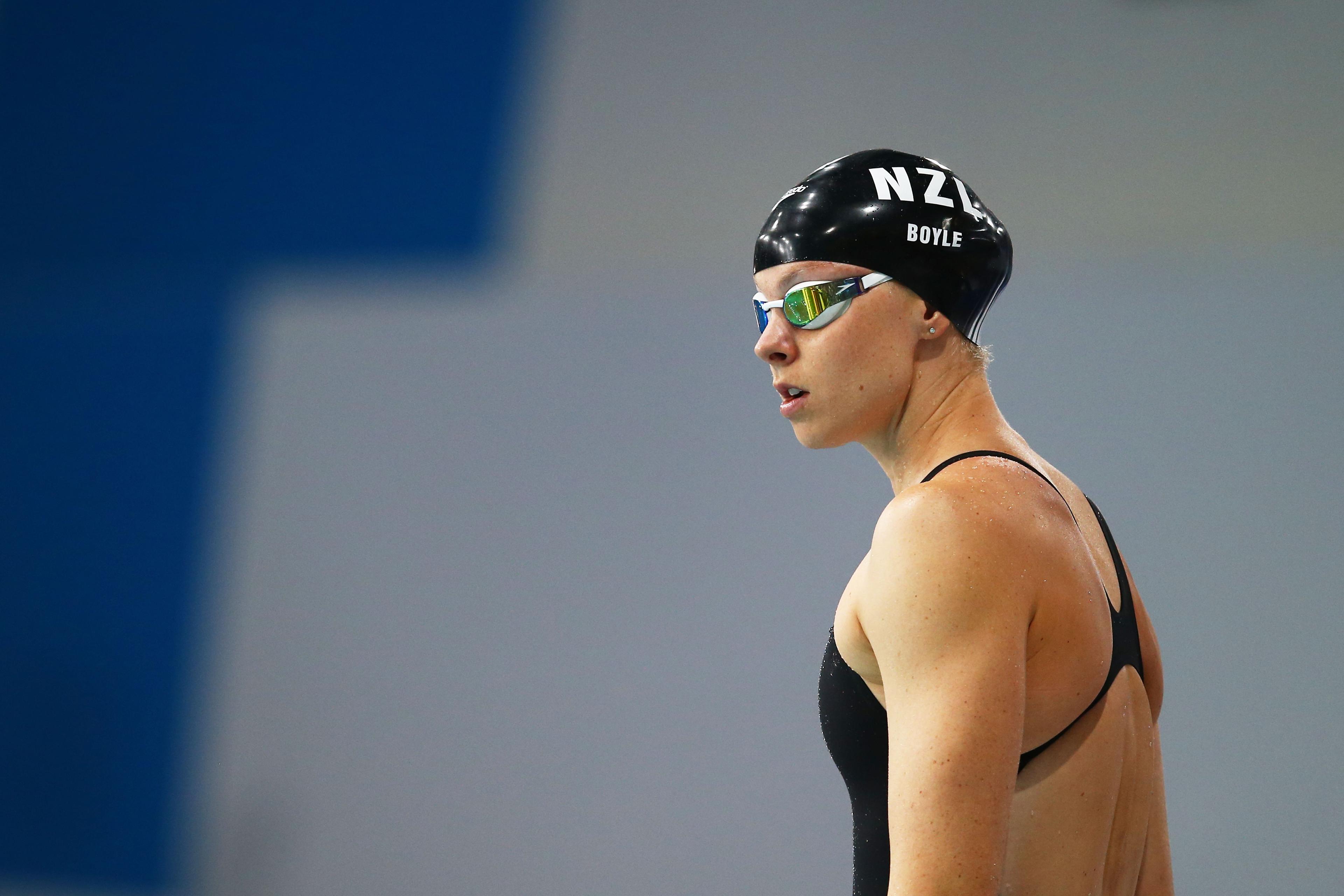 Olympic bound swimmers scores wins at USA swim meet