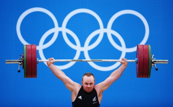 Weightlifter finishes down the field