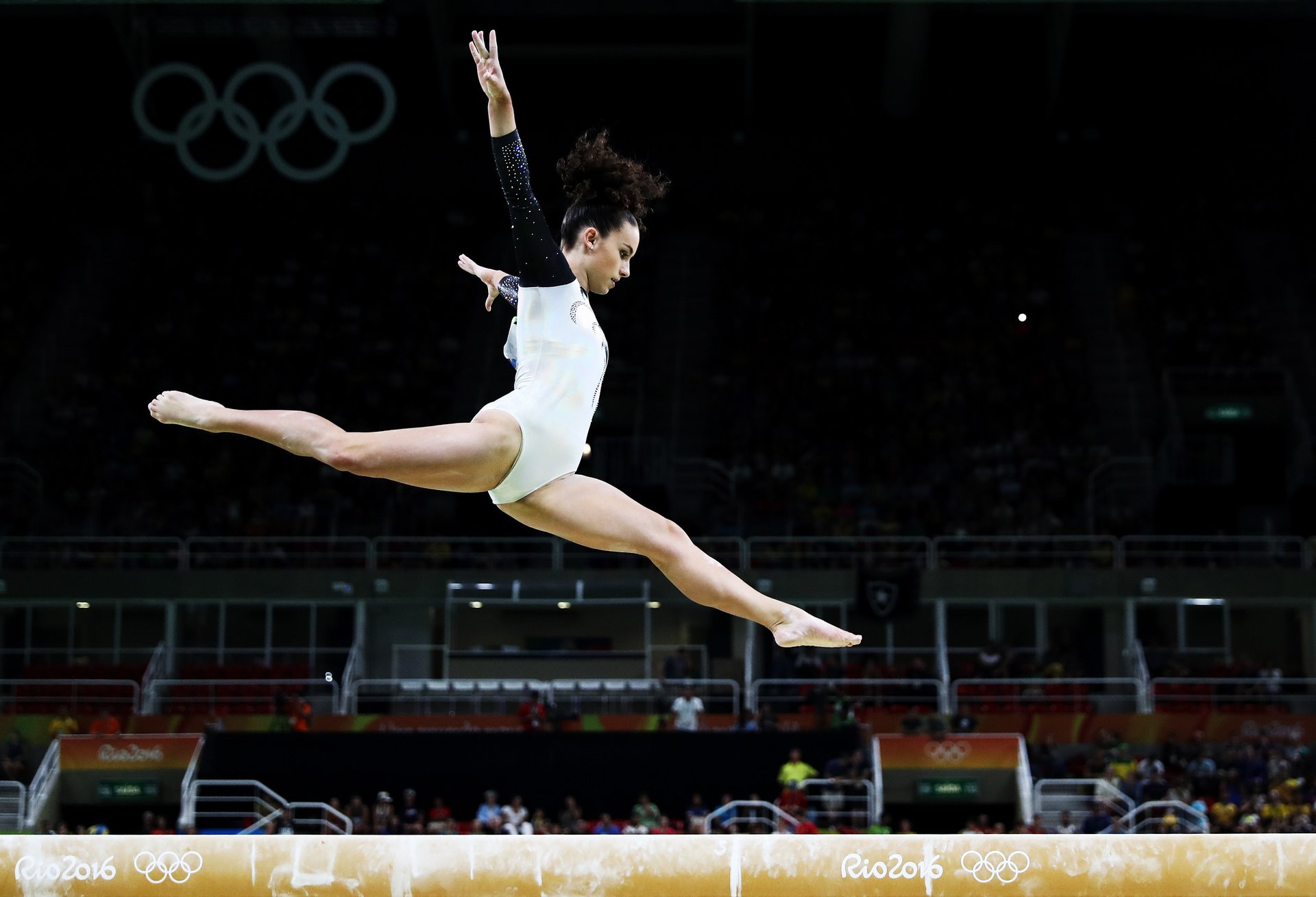 Young gymnast mixes with big names