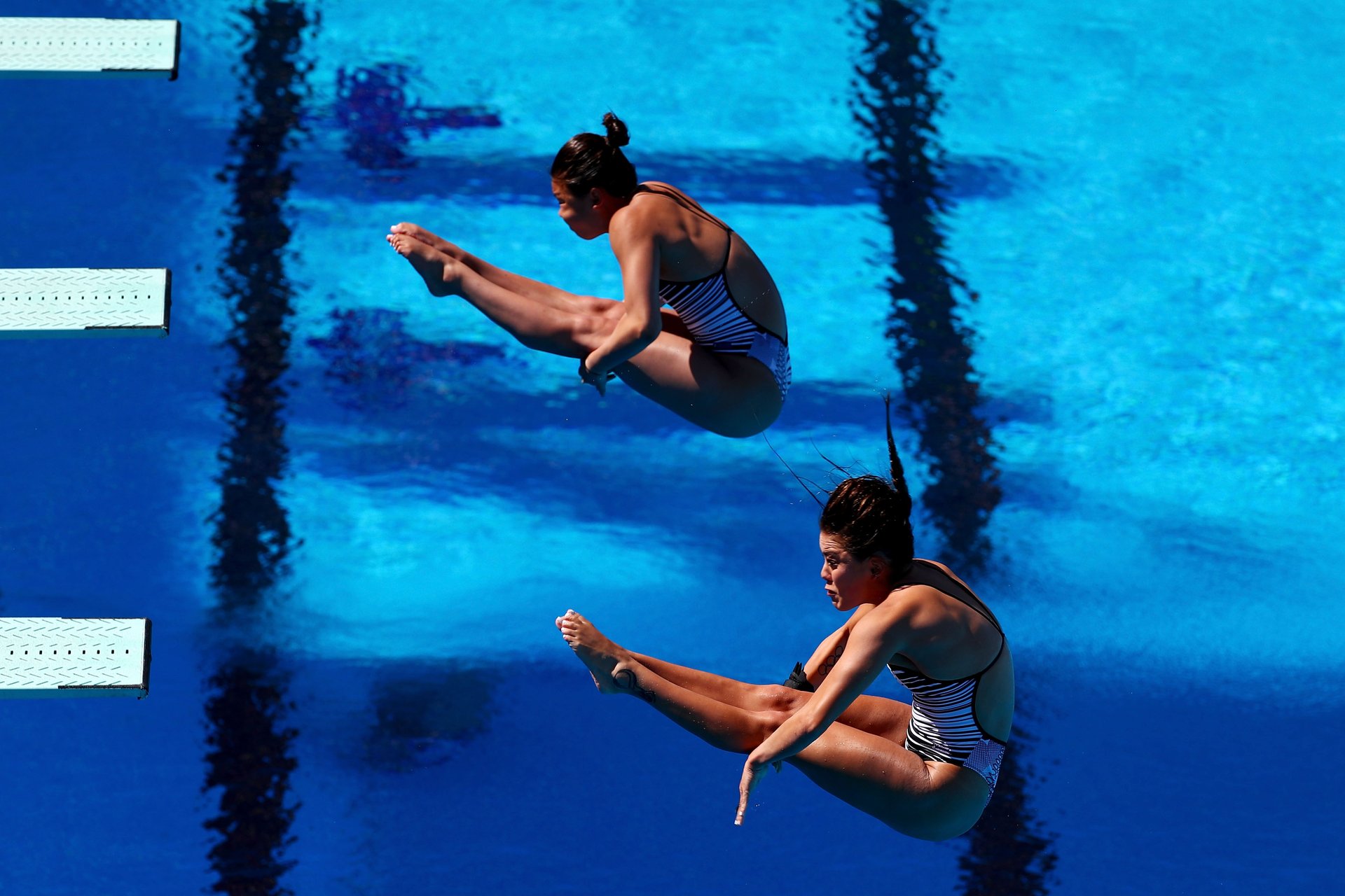 Synchro divers just miss a medal