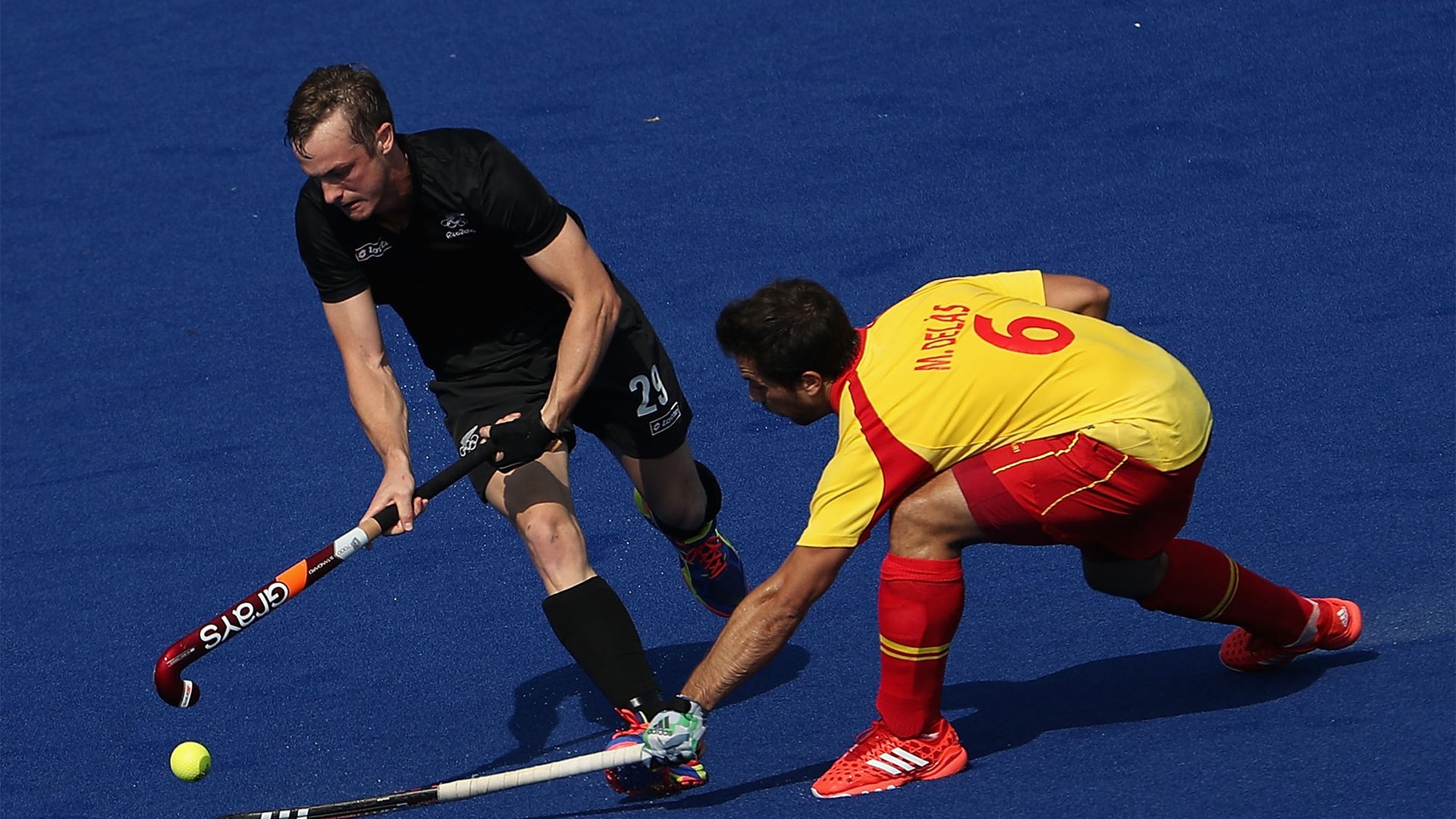 Hockey men beaten by Spain