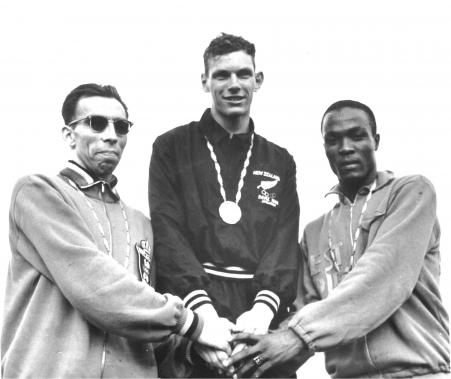 Peter Snell (centre) on the podium with silver medallist Roger Moens of Belgium (left) and Bronze medallist George Ezekiel Kerr of Jamaica (right) at the Games of the XVII Olympiad, Rome 1960. Photo: New Zealand Olympic Museum Collection.