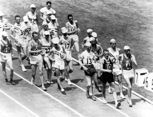 Norman Read leads the field during the 50km Walk final finishing with a 400 yard lead, taking the Gold medal at the Games of the XVI Olympiad, Melbourne 1956. Photo: Getty Images.