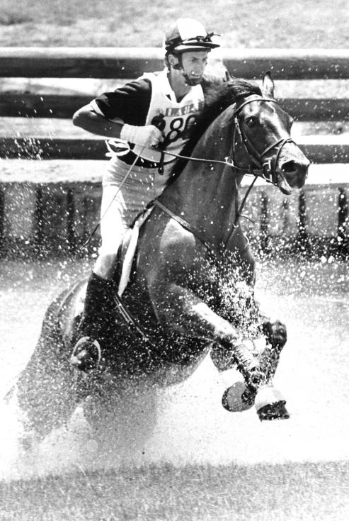 Mark Todd on Charisma exits the first water jump during the endurance equestrian event at the Games of the XXIII Olympiad, Los Angeles 1984. Photo: New Zealand Olympic Museum Collection.