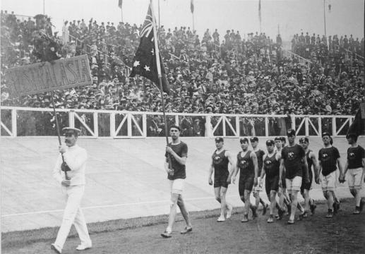 Flagbearer Henry Murray leads the Australasian team into the Olympic Stadium during the Opening Ceremony at the Games of the IV Olympiad, London 1908. Photo: New Zealand Olympic Museum Collection. 